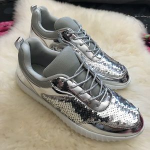 NWT Silver sequence gym shoes. Shiny metallic hot